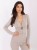 pol_pl_Bezowe-eleganckie-body-z-glebokim-dekoltem-415392_1.jpg