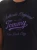 pol_pl_T-shirt-damski-Tommy-Jeans-DW0DW21404-BDS-CZARNY-26956_2.webp